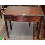 A Georgian style serpentine front side table with single frieze drawer and moulded square supports