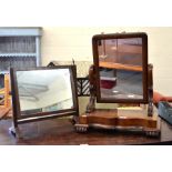 A Victorian mahogany toilet mirror on serpentine platform base with scroll feet to/w smaller