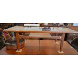 A 1960's G Plan style teak coffee table with central inset glass panel and open under tier