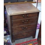 A small mahogany chest with faux drawer fall front panel over two drawers raised on bracket feet