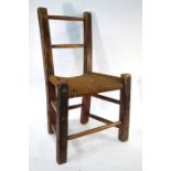 A 19th Century Irish Galway vernacular standard chair with rope seat