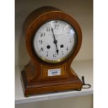 An inlaid Silversmith & Co., London twin-train mantel clock with key