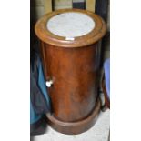 A 19th century mahogany circular bedside cupboard with inset marble top