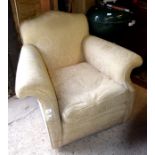 Upholstered French deep seated armchair with shaped back and flared arms