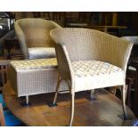 Two gold painted Lloyd Loom style arm chairs to/w a matching ottoman (3)