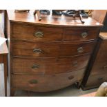 A 19th century mahogany chest of two short over three long drawers raised on splayed bracket feet