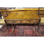 A Regency style mahogany drop leaf sofa table with two drawers