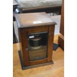 A small oak table top smoker's cabinet with tobacco storage jar, to/w a large pictorial vintage