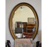 Victorian oval gilt framed mirror (plate showing damages)