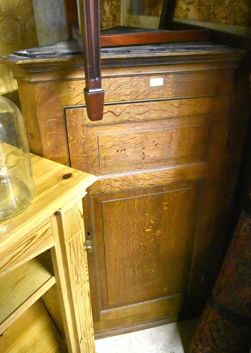 19th century large oak hanging corner cupboard with single panelled door