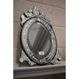 A Venetian style bevelled edge trestle mirror