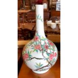 A famille rose, Chinese vase, decorated with a prunus or floral design; underglaze blue six-