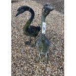 A companion (differing) pair of cast alloy garden Geese (2)