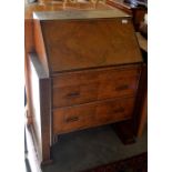 Art Deco style walnut fall front bureau with fitted interior over two long drawers