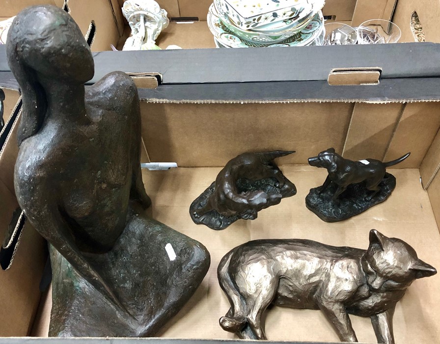 A modern pottery sculpture of a seated woman, Frith Sculpture of a lying cat, a Heredities Ltd model