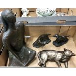 A modern pottery sculpture of a seated woman, Frith Sculpture of a lying cat, a Heredities Ltd model