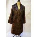 A vintage lady's squirrel fur coat, 48 cm across chestWorn condition, balding to opening edges of