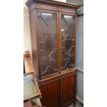 French mahogany bookcase cabinet in two parts, with glazed doors over panelled cupboard doors (a/f)