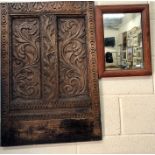 An antique carved oak panel to/w a small teak framed mirror (2)