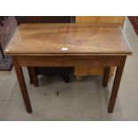 A 19th century mahogany folding tea table on moulded square supports