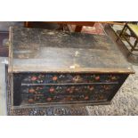 An antique stained pine Hungarian wedding chest with floral polychrome decoration and wrought iron
