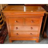 Simon Horn cherrywood chest of two short over two long drawers with turned pulls raised on