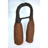 A Nigerian, or other West African, percussion instrument; possibly an Igbo Ogene, or a Shentu from