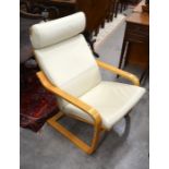 Ikea beech framed bentwood cantilever armchair with cream leather upholstery