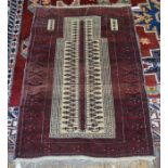 A Balouch hatchi design camel ground prayer rug with geometric borders 101 x 76 cm