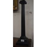 A tall cast metal neo-classical column table lamp