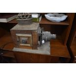 A vintage brass and mahogany magic lantern, to/w a pierced brass fender (2)