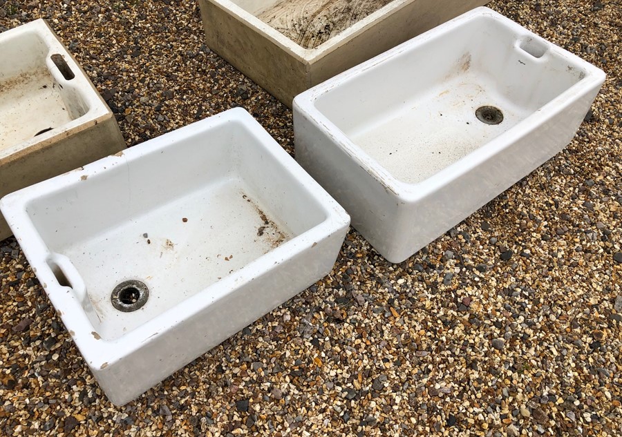 Two old stone sinks (planters)