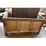 A rectangular twin handled oak planter of panelled and jointed construction