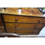 A 19th century mahogany chest of three long drawers raised on a plinth base (A/F)