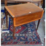 A 19th century crossbanded mahogany pembroke table with end drawer and opposing dummy drawer