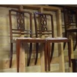 Four Edwardian mahogany inlaid dining chairs with lattice backs - for re-upholstery