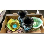 A pair of Victorian dark glass vases enamelled in turquoise with birds and blossom in the Japanese