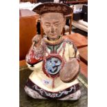 A Chinese provincial seated figure of a Chinese drummer with nodding head and right arm, a/f