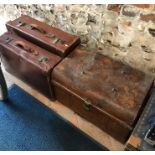 A vintage dome top tin trunk to/w two brown leather travel cases (3)