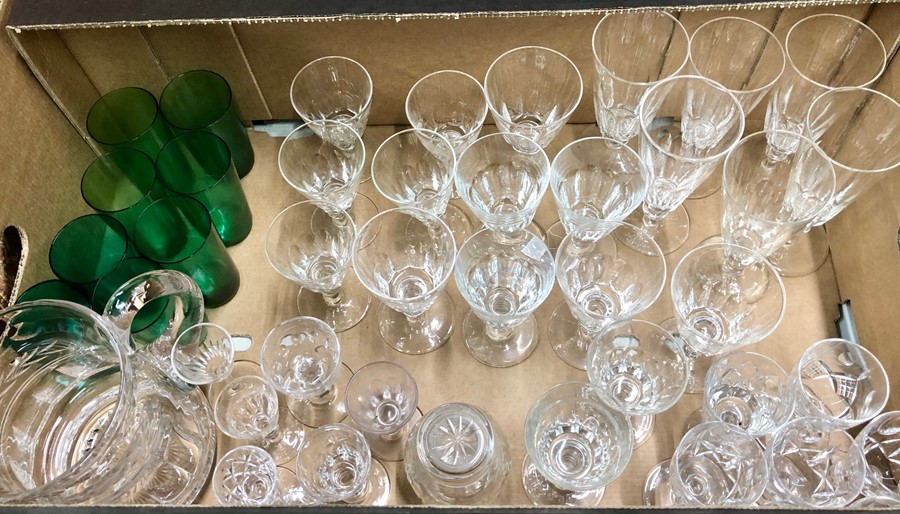 A suite of 18th century style drinking glasses to/w a cut glass water jug and eight green glass