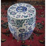 A modern Chinese barrel seat of typical form, decorated with floral designs