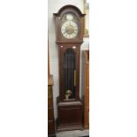 A mahogany longcase clock the brass dial with silvered chapter ring and roman numerals, glazed