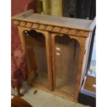 An old pine gothic style bookcase/display cabinet with a pair of glazed doors (A/F)