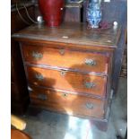 A part 18th century oak chest of three long drawers raised on bracket feet (A/F) 86 x 53 x 90cm