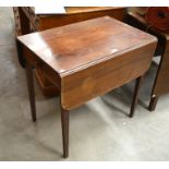 A 19th century pembroke table with end drawer and opposing dummy drawer raised on tapering square