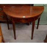 A 19th century inlaid mahogany demi-lune card table on tapering square supports with spade feet