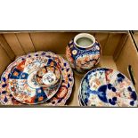 A Japanese Imari dish of kikugata form, 35 cm diameter; together with nine other pieces of