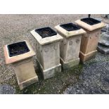 J M Blashfield, Stamford, a trio of antique chimney pots with moulded roundel decoration to/w an