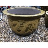 A single octagonal Japanese glazed terracotta planter