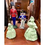 Sitzenforf models of a foot soldier and a 'Foots Guards Captain' and two green glazed figurines (4)